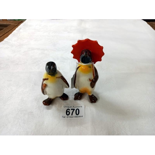 670 - Two Beswick penguins.