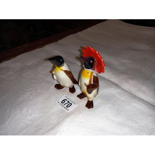 670 - Two Beswick penguins.