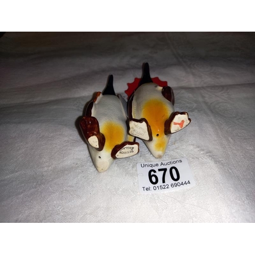 670 - Two Beswick penguins.