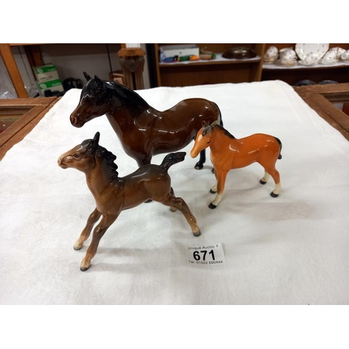 671 - Three Beswick horses.