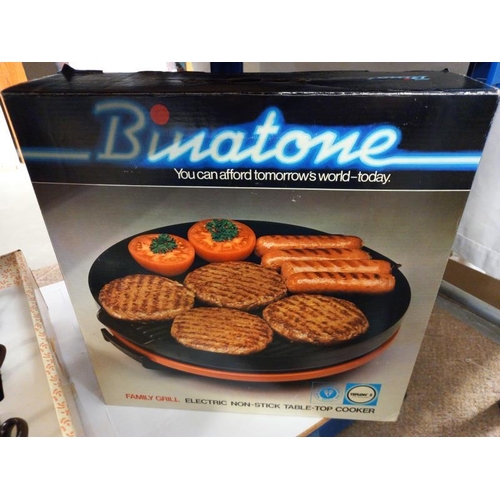 679 - A boxed new Binatone Teflon family grill, kettle and teaset (missing 2 saucers).