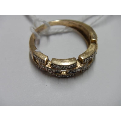 36 - A white/yellow gold Greek key pattern diamond ring, size O, 3.5 grams