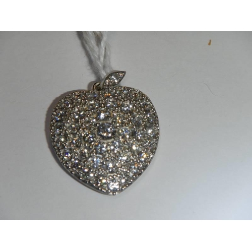 47 - A 4.5 carat diamond and platinum heart pendant, 18.2 grams.