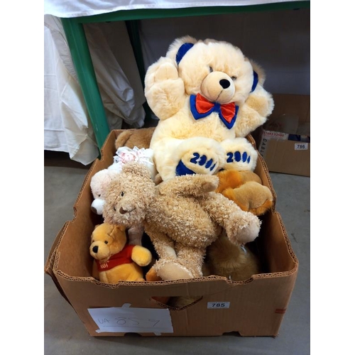 785 - A box of soft toys including Winnie The Pooh, teddies etc