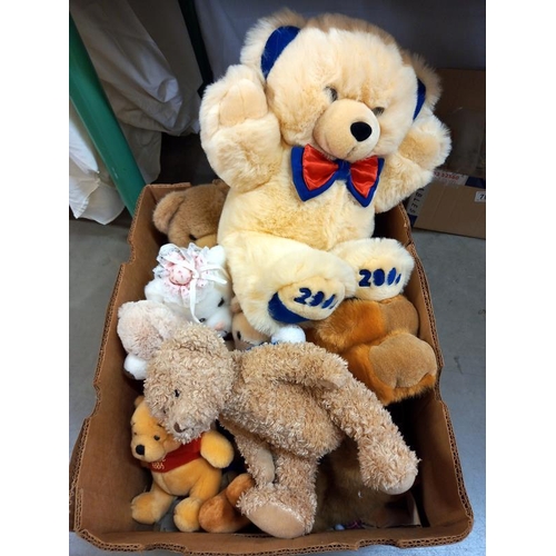 785 - A box of soft toys including Winnie The Pooh, teddies etc