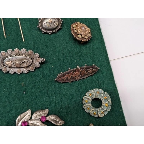 51 - Nine vintage brooches and four stick pins, Victorian to 1960's including silver and gold examples.