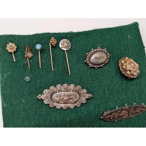 51 - Nine vintage brooches and four stick pins, Victorian to 1960's including silver and gold examples.