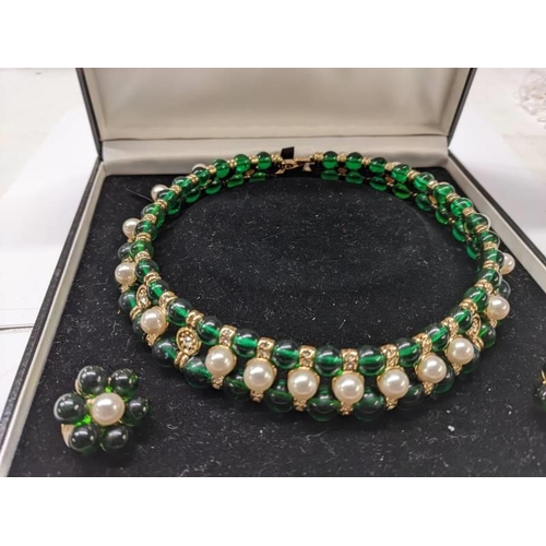 57 - A choker style green stone and pearl necklace with matching earrings.