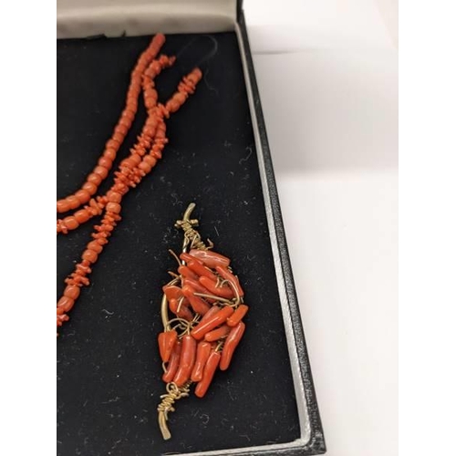 59 - A red coral necklace with attached pendant and a 19th century similar brooch.