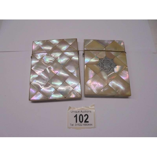 102 - Two mother of pearl card cases (one with silver cartouche).