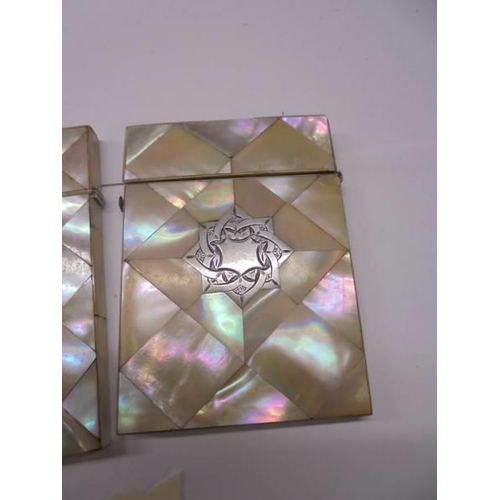 102 - Two mother of pearl card cases (one with silver cartouche).