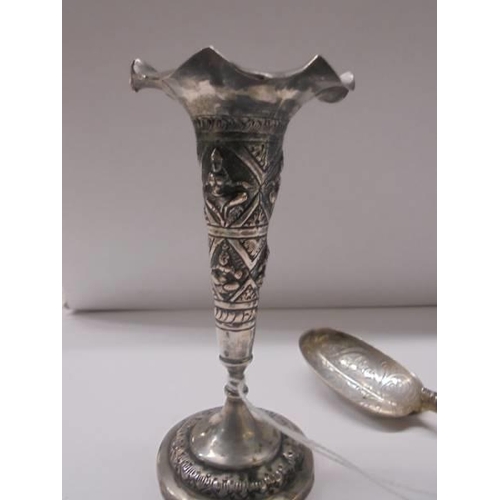 107 - An Asian silver spill vase and spoon.