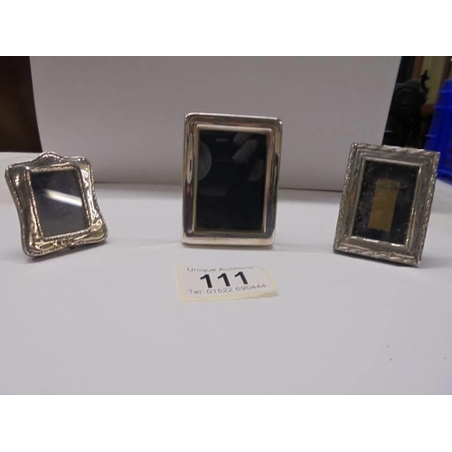 111 - Three small silver photo frames, 7 x 5 cm, 6 x 4.5 cm and 5 x 3.5 cm.