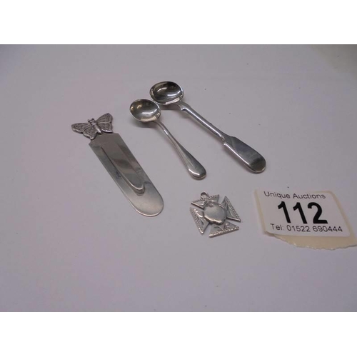 112 - A silver salt spoon, mustard spoon, bookmark and fob, 33.7 grams.