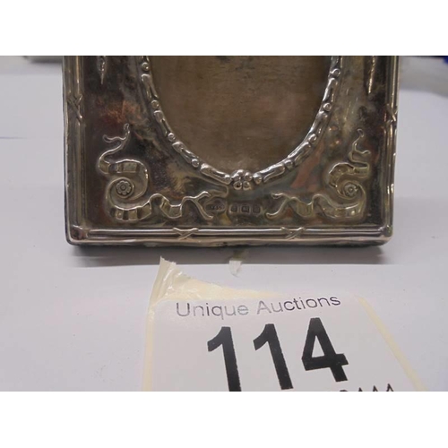 114 - An Adam style silver photo frame, 9 x 7 cm.