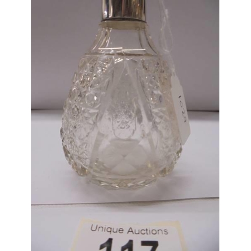 117 - A glass scent bottle with silver collar.