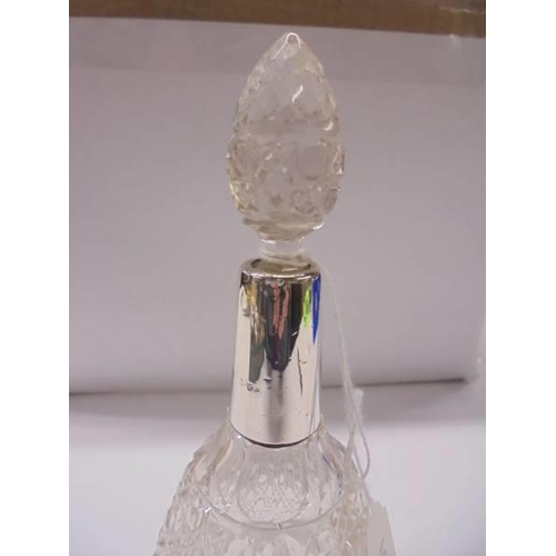 117 - A glass scent bottle with silver collar.