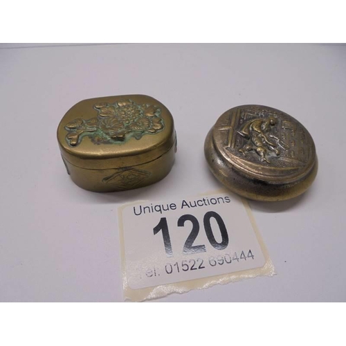 120 - Two antique embossed metal pill boxes.