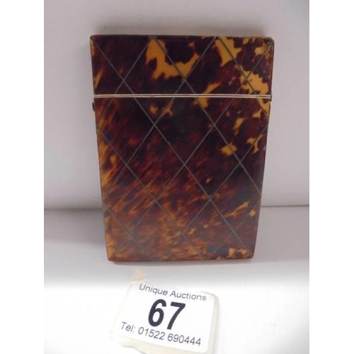 67 - A tortoiseshell card case.