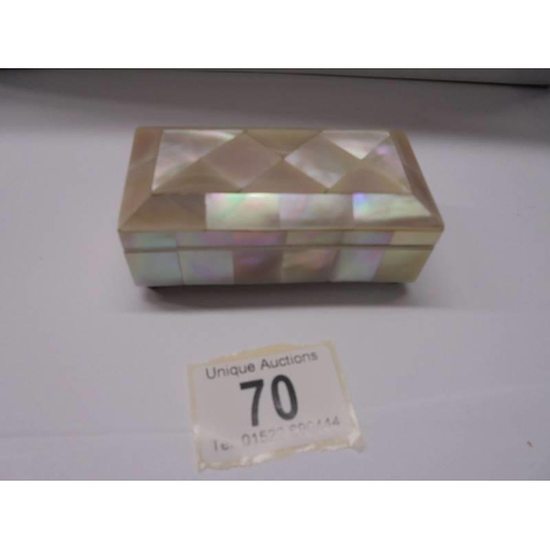 70 - A three section mother of pearl stamp box.