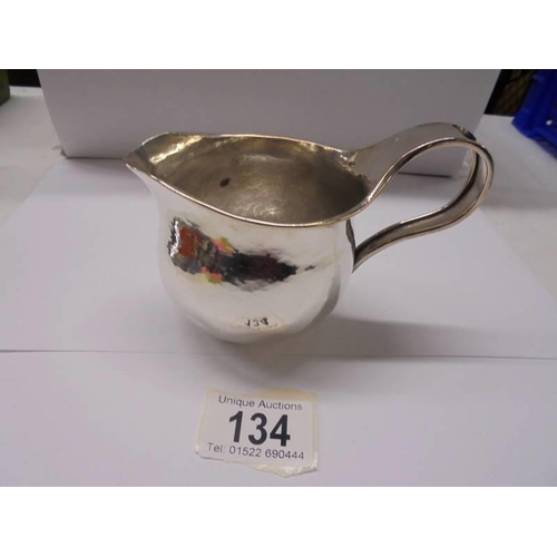 134 - A hall marked silver jug, 5.9 ounces.