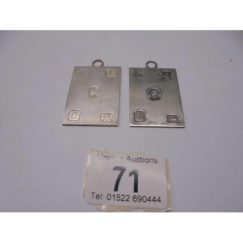 71 - Two hall marked silver medallions. 35 grams.