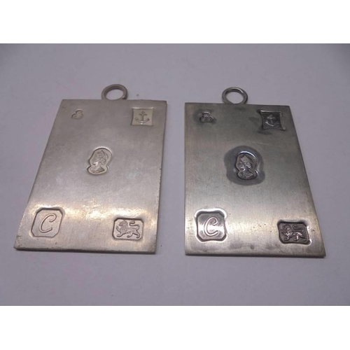 71 - Two hall marked silver medallions. 35 grams.