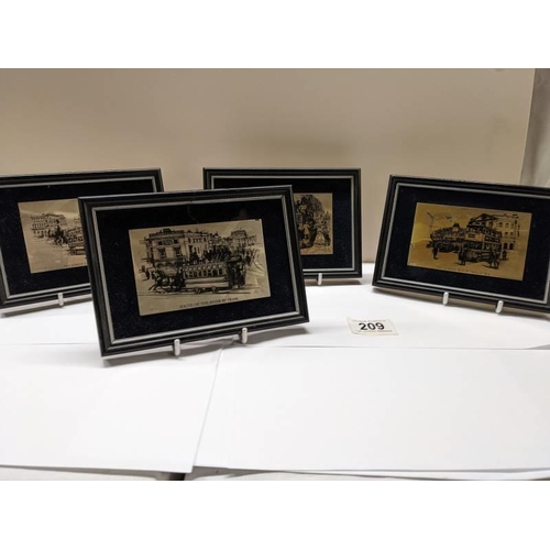 209 - Four framed engravings on silver featuring old forms of transport.