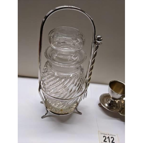 212 - A silver plate egg cup stand and a pickle jar on silver plate stand.