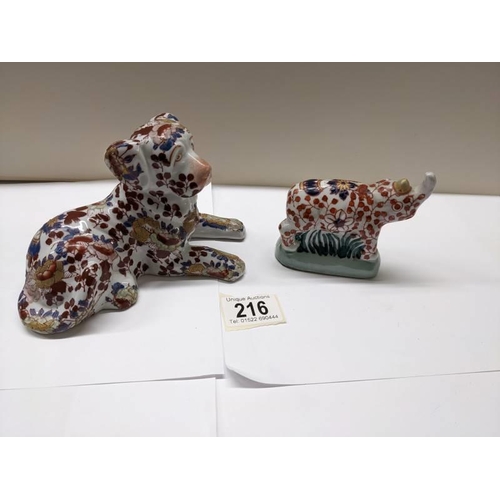 216 - Two signed Imari animals being a dog and rare rhino (Ya You Zhen).