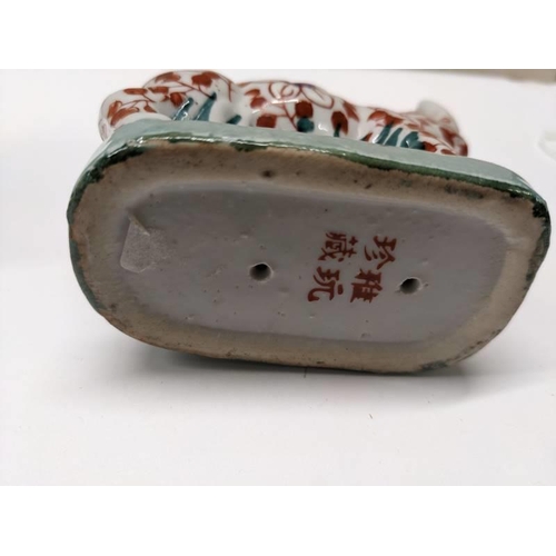 216 - Two signed Imari animals being a dog and rare rhino (Ya You Zhen).