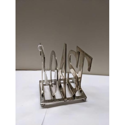 225 - A rare art deco silver plate toast rack.