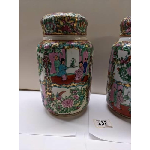 232 - A pair of large Cantonese Famille Rose lidded ginger jars, 25.5 cm tall.