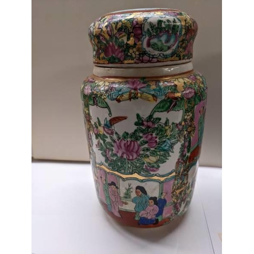 232 - A pair of large Cantonese Famille Rose lidded ginger jars, 25.5 cm tall.