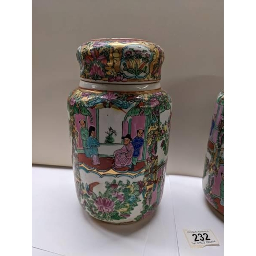 232 - A pair of large Cantonese Famille Rose lidded ginger jars, 25.5 cm tall.