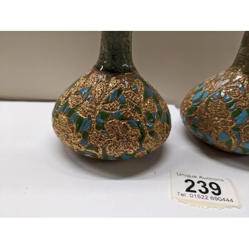 239 - A pair of Doulton Slater vases.