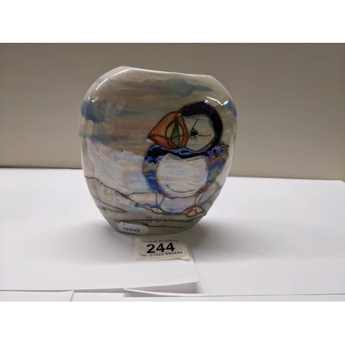 244 - A Lise B Moorcroft vase featuring puffins, dated 2011.