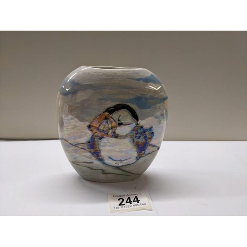 244 - A Lise B Moorcroft vase featuring puffins, dated 2011.