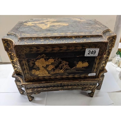 249 - An early Japanese lacquered box on stand, a/f (has had some restoration but needs more).