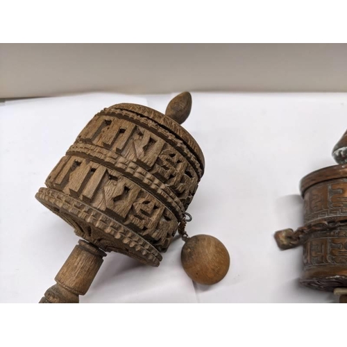 256 - Three antique Tibetan prayer wheels.