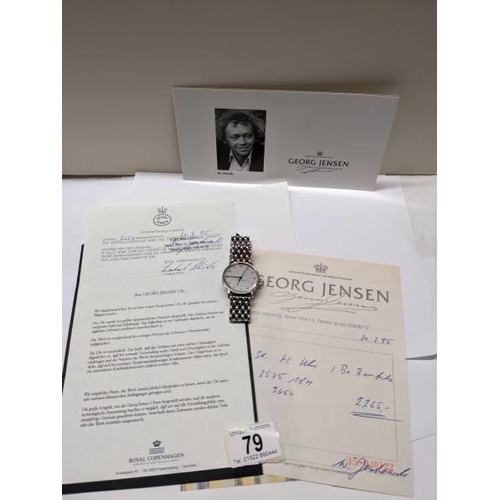 79 - A Georg Jensen automatic gents wrist watch with receipt and guarantee, dated 1995 in German.