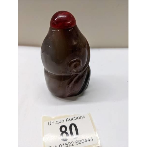 80 - A Chinese agate scent bottle with gourd, tendril, leaf decoration.