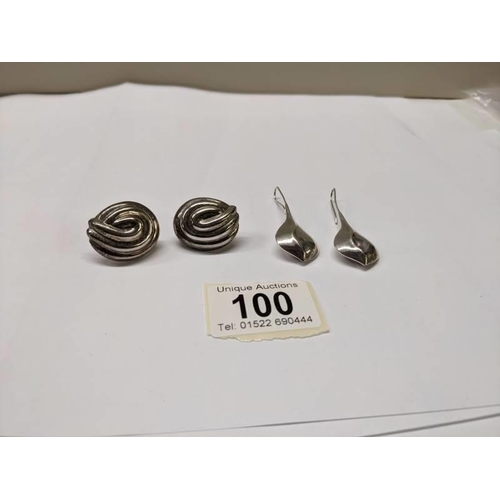 100 - Two pairs of silver earrings, one pendant style and one clip. 14.8 grams.