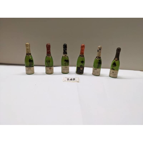 148 - Six vintage cc12 bottles of champagne including De Thaile Decorter de Brienne.