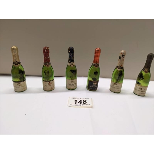 148 - Six vintage cc12 bottles of champagne including De Thaile Decorter de Brienne.