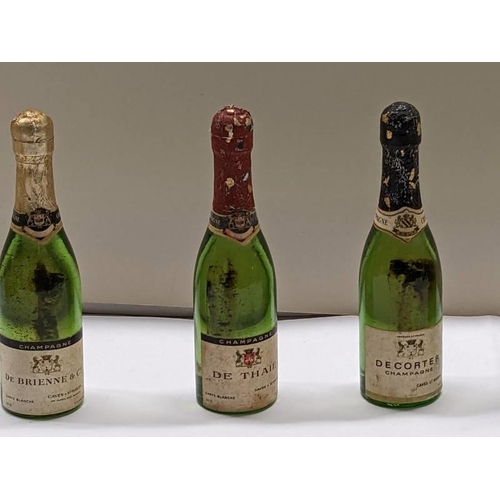 148 - Six vintage cc12 bottles of champagne including De Thaile Decorter de Brienne.