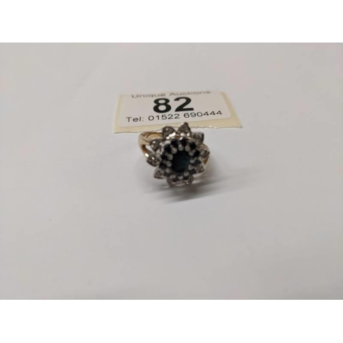 82 - A diamond and sapphire cluster ring in 9ct gold, size M, 3.8 grams.