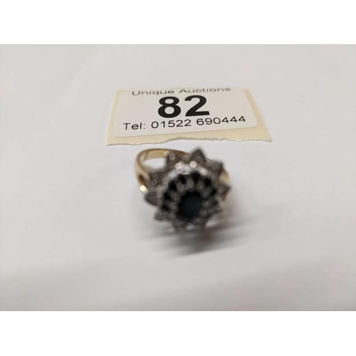 82 - A diamond and sapphire cluster ring in 9ct gold, size M, 3.8 grams.