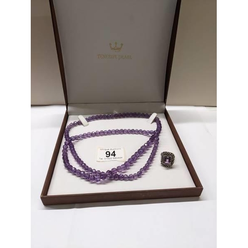 94 - A long natural amethyst necklace and an amethyst ring circa 1970's in a heavy textured mount.