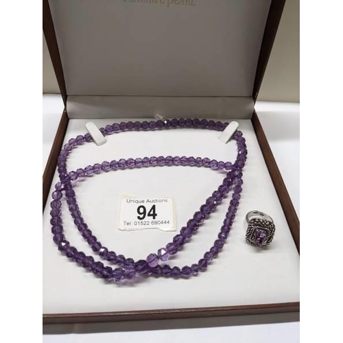 94 - A long natural amethyst necklace and an amethyst ring circa 1970's in a heavy textured mount.